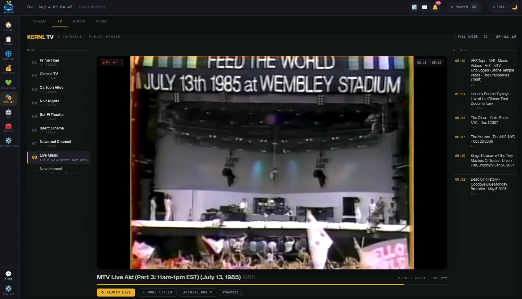 Kernl TV: an eight-channel dial down the left, a player showing a public-domain Live Aid broadcast from 1985, and an Up Next schedule of upcoming programmes on the right.